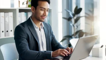 Man at a laptop in office