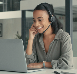 A customer service representative with her headphones