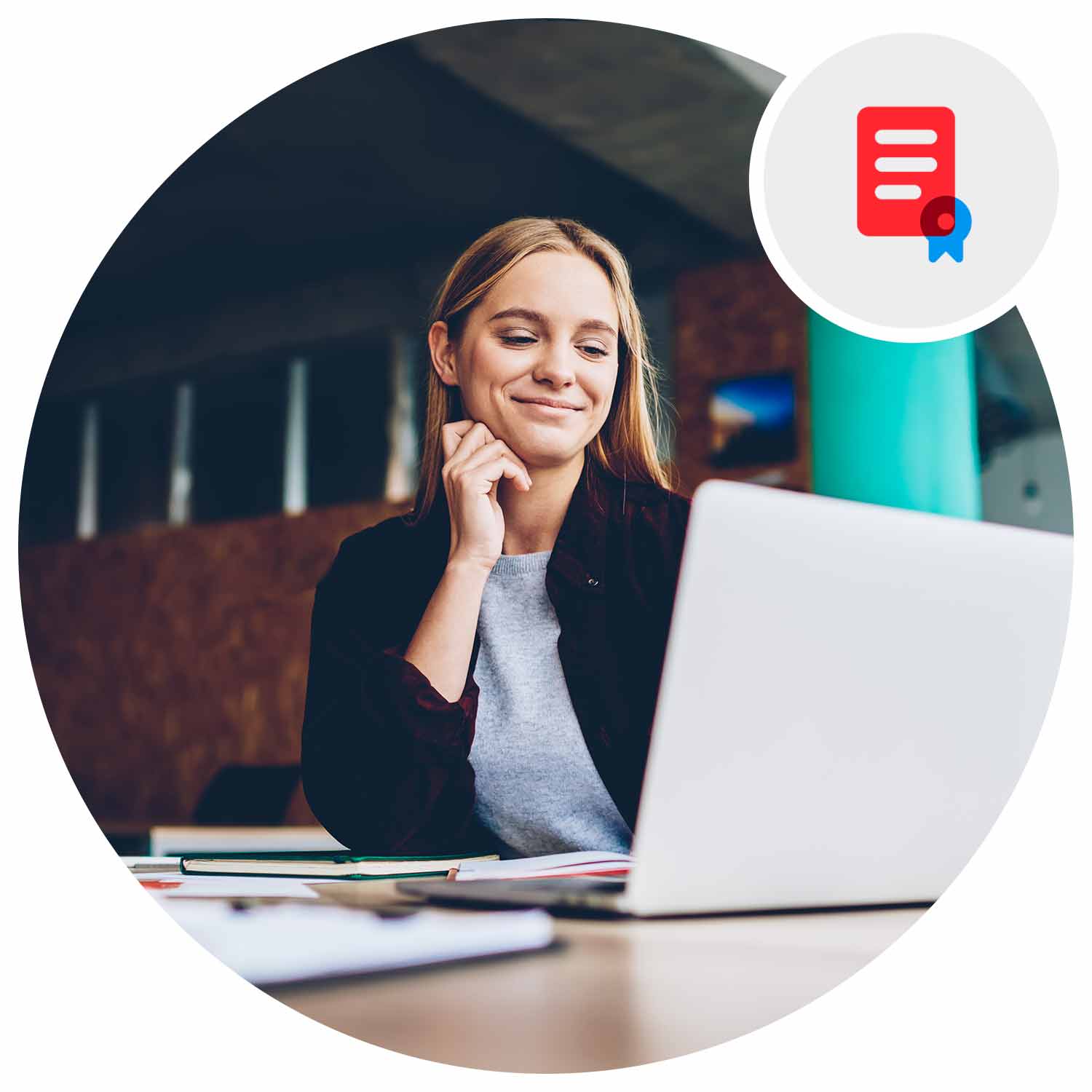 Woman looking at a laptop smiling