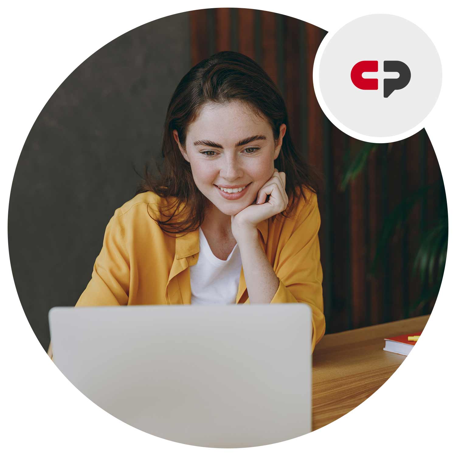 Woman looking at laptop on the desk