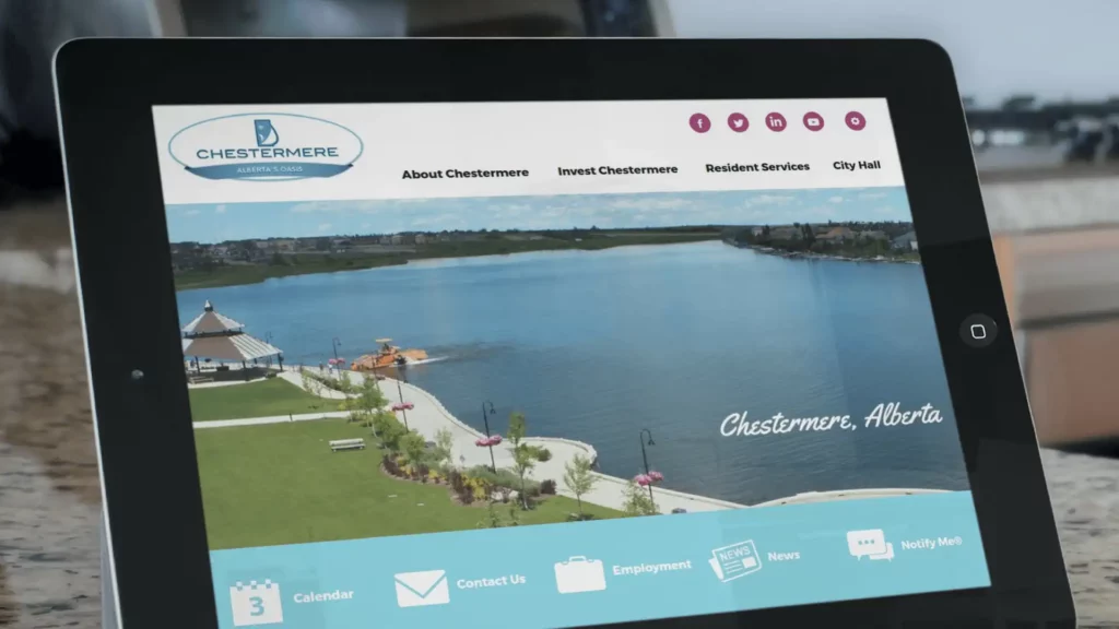 Computer screen displays the homepage of Chestermere, Alberta, Canada