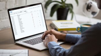 A laptop displays a list of the City of Escondio's agendas and meeting minutes