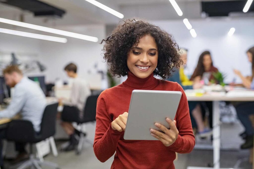 Woman using a tablet in an office