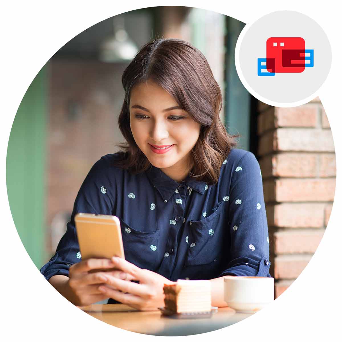 Smiling woman using a phone in a restaurant
