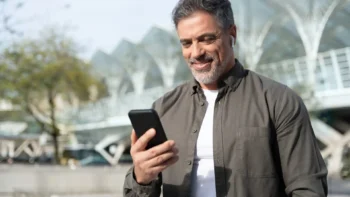 man looking at his cell phone