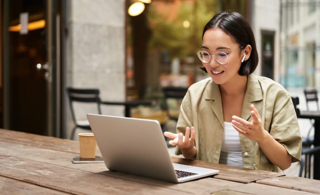 Woman at a laptop on a call