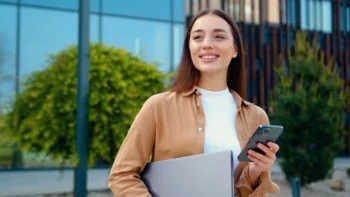 Woman holding cell phone