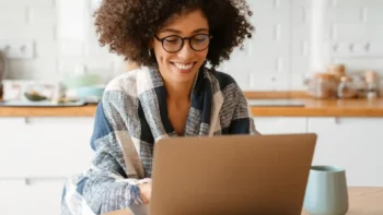 woman looking at her laptop