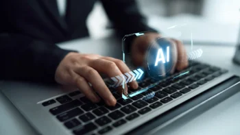 hands on a keyboard with the word AI