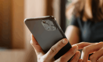 hands holding a cell phone